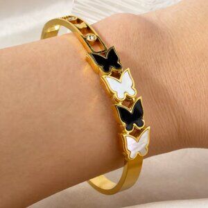 Exquisite Geometric Black and White Butterfly-Accented Stainless Steel Bracelet